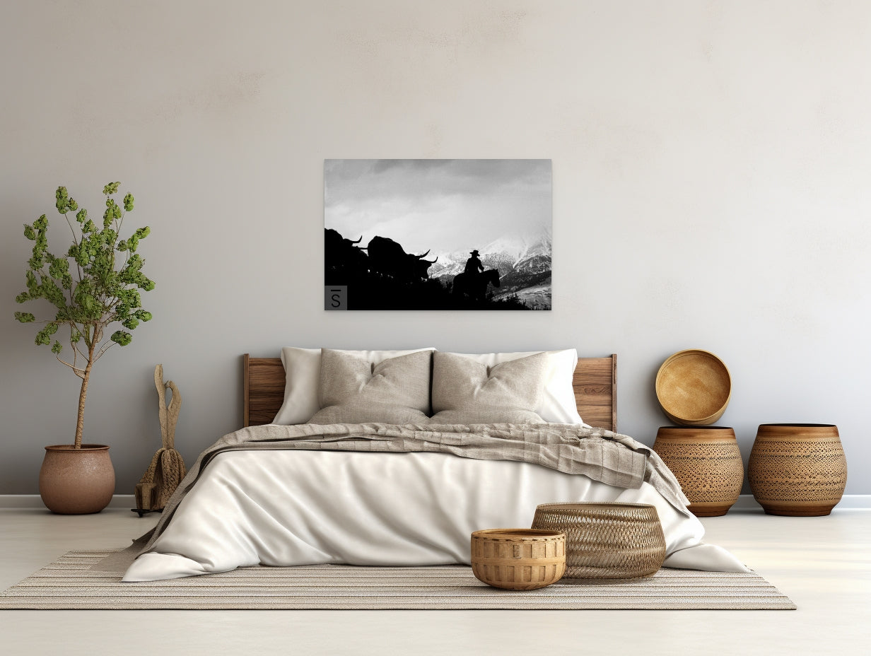 Bulls descend the mountain with their cowboy. Western fine art by David Stoecklein.