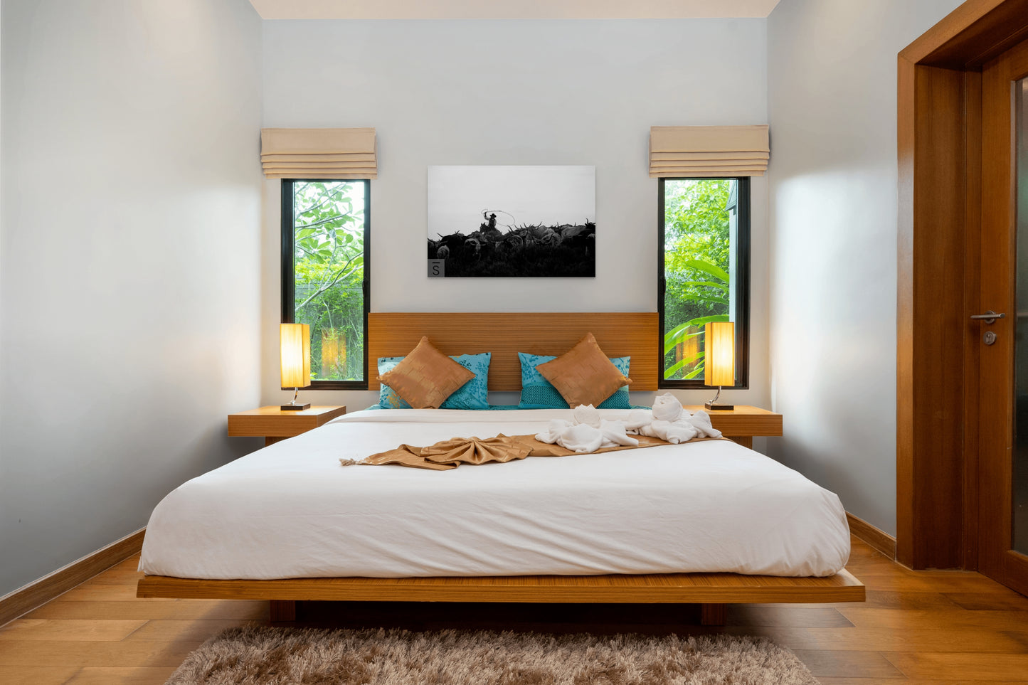 A cowboy herds his cattle. Black and white western fine art photography by David Stoecklein.