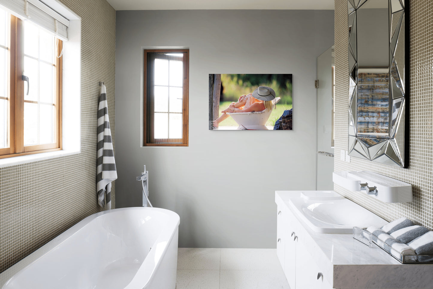 A cowgirl bathes in a bath tub in this western image by David Stoecklein. Cowgirl photography by David Stoecklein