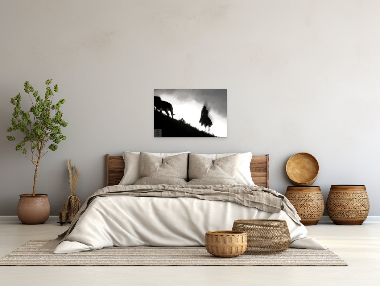 A cowboy rides at dusk in this black and white print by David Stoecklein. Western Fine Art Photography. 