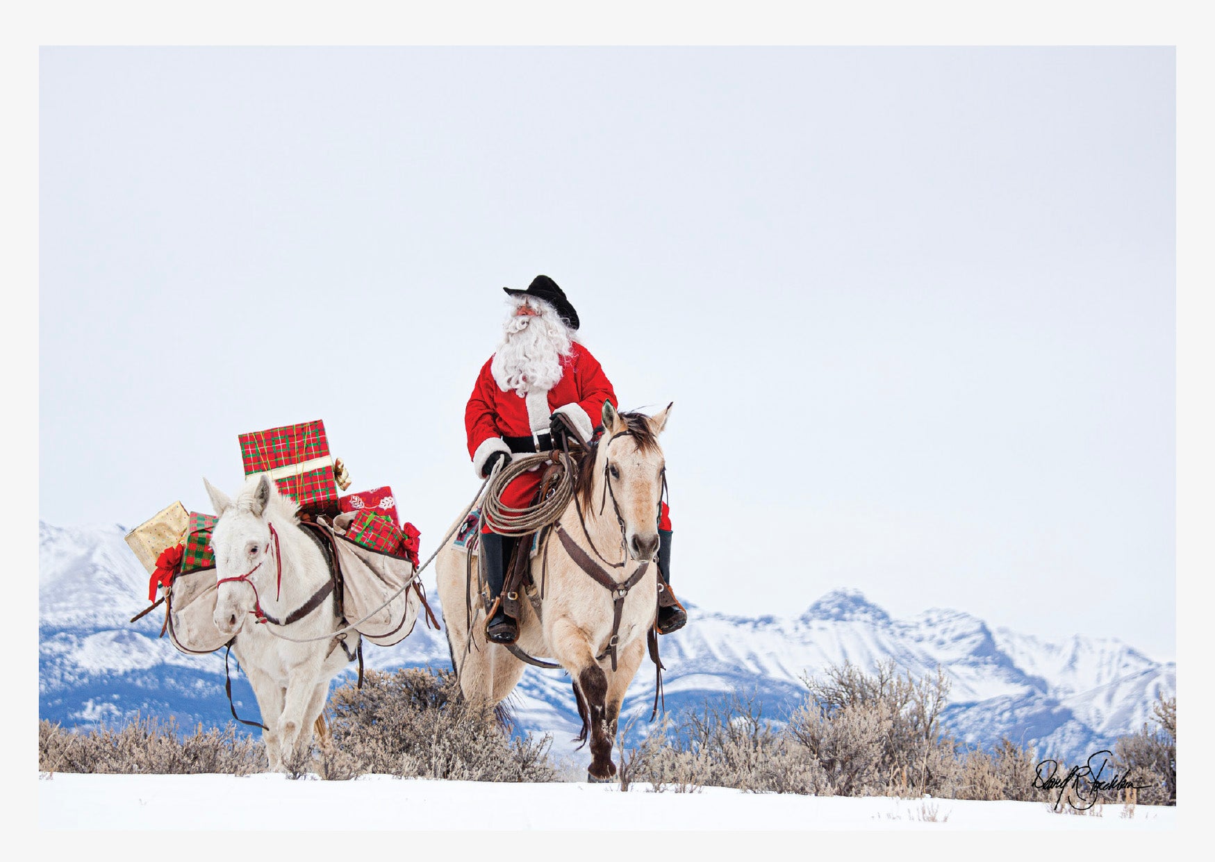 A western-themed notecard with Santa on his horse. Western fine art photography by David Stoecklein.