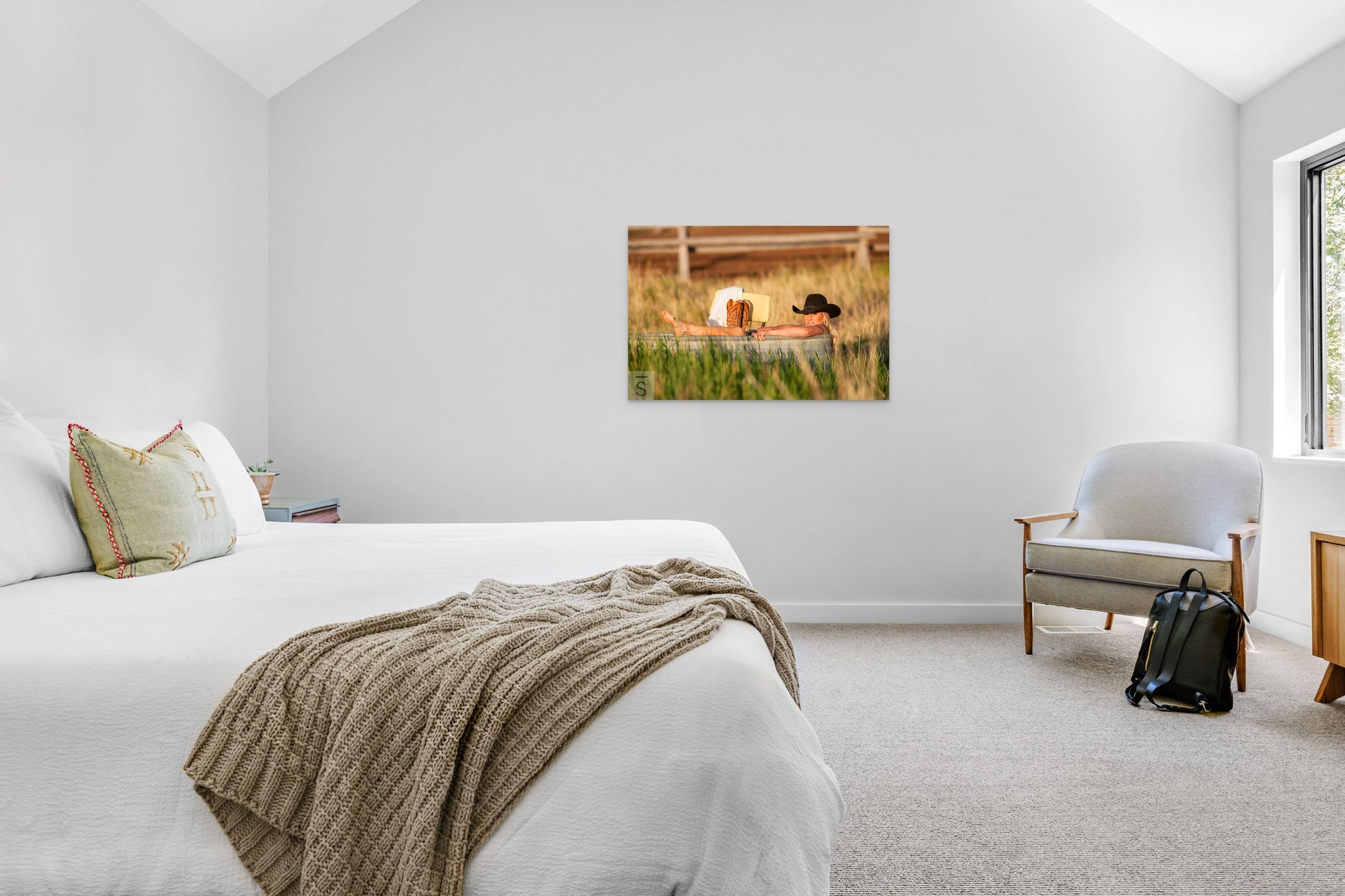 A cowgirl relaxes in a tub outside. Western fine art photography by David Stoecklein.