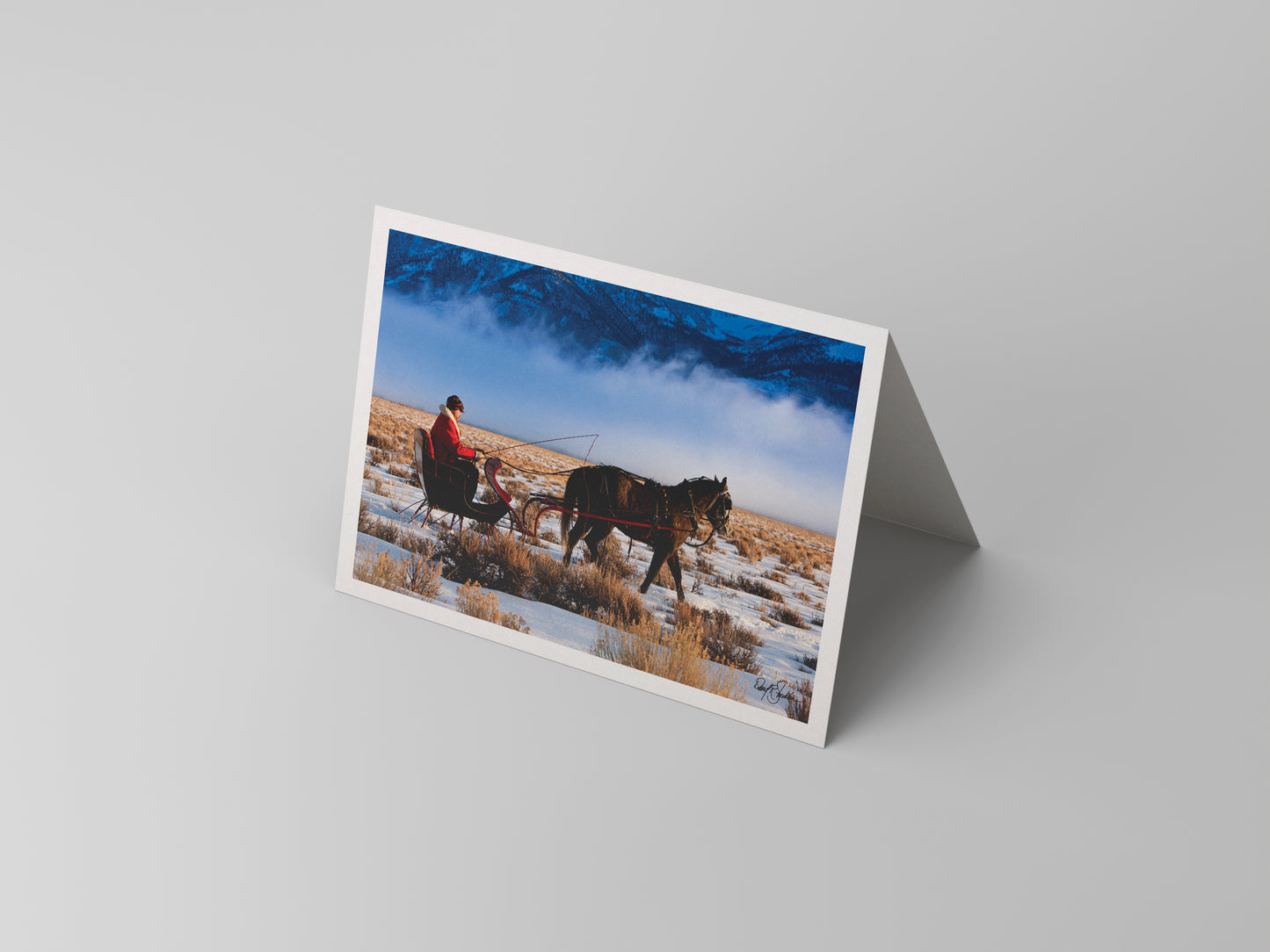 Christmas-themed note cards featuring the western fine art photography of David Stoecklein. Santa's winter sleigh is pulled by a team of horses.