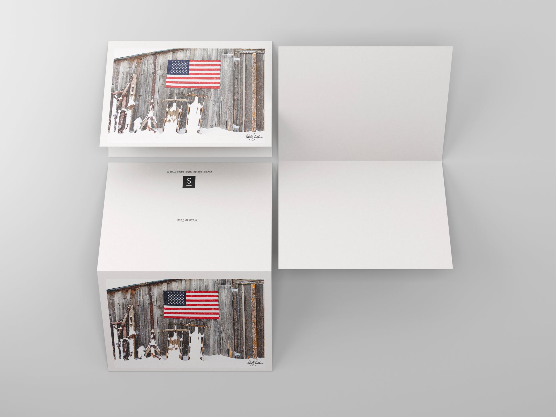 An American flag hangs in this western-themed notecard featuring fine art photography of David Stoecklein. 