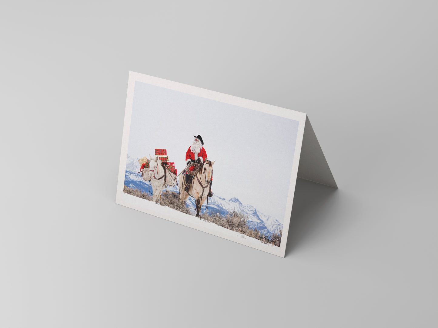 A western-themed notecard with Santa on his horse. Western fine art photography by David Stoecklein.