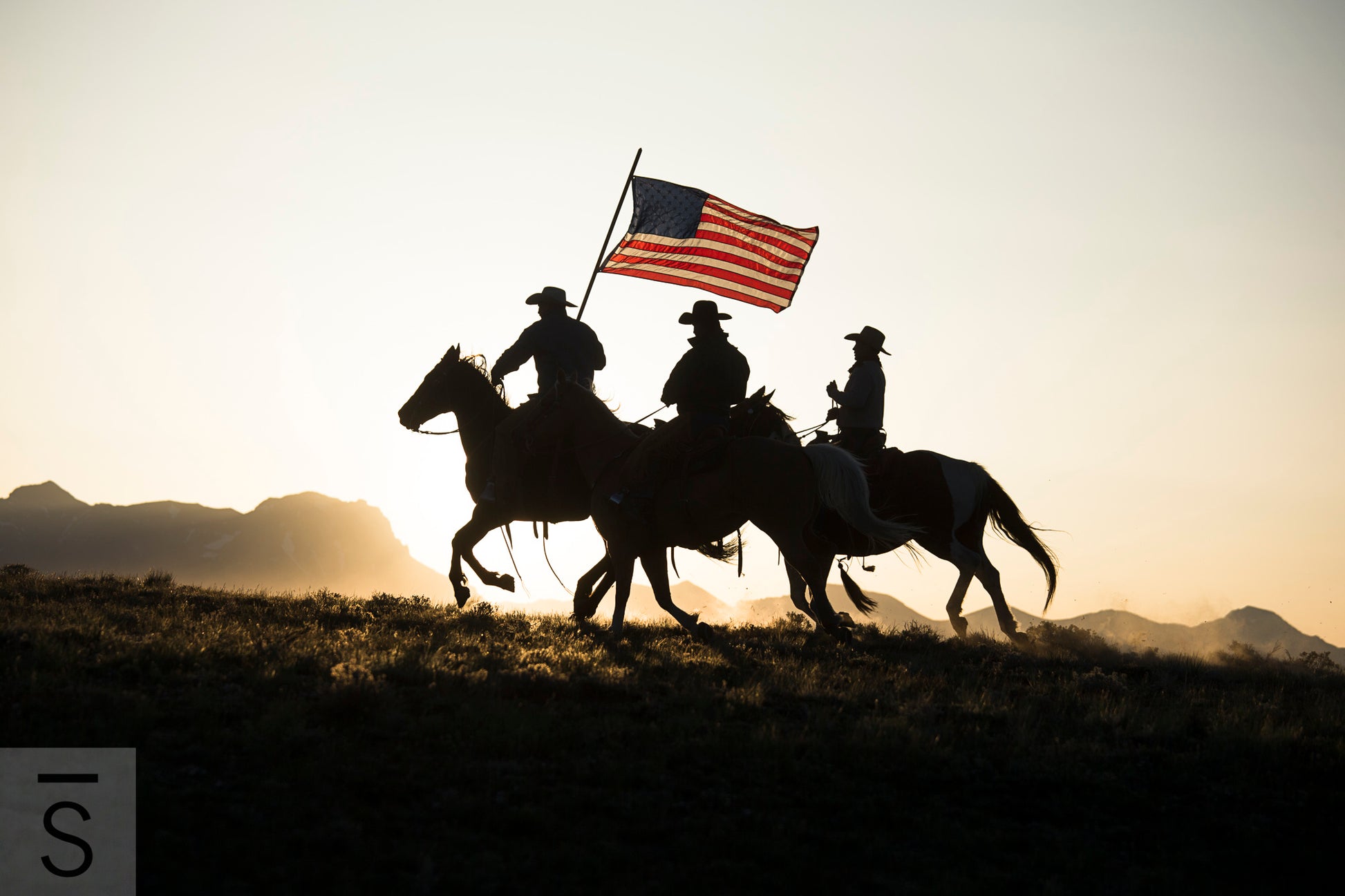 Cowboys and the American flag. Western Fine art photography by David Stoecklein.