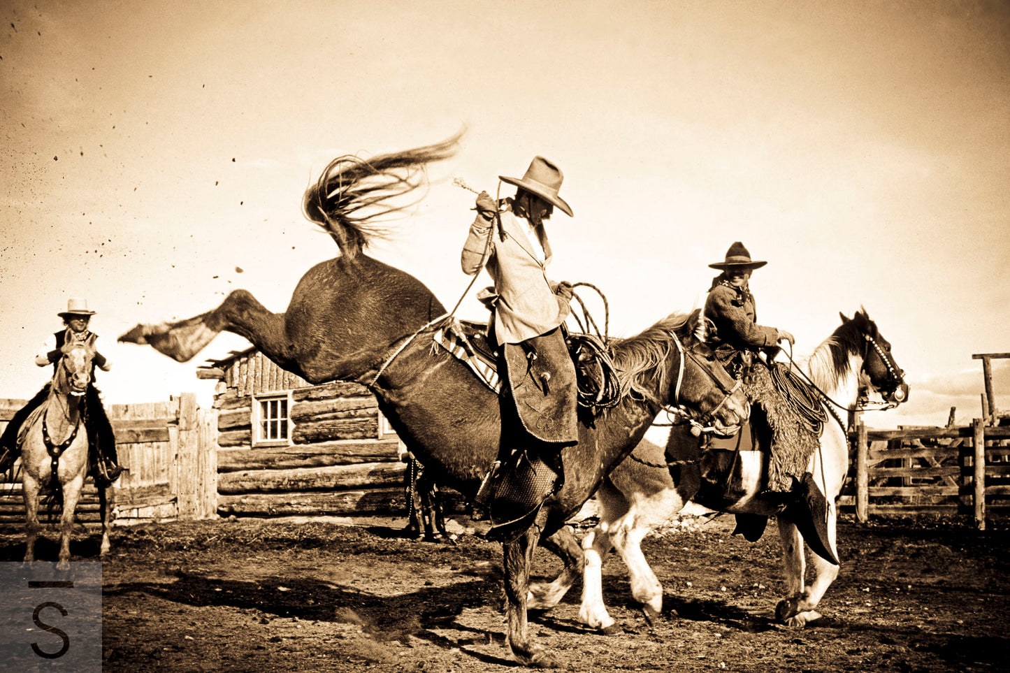 Western Fine Art Photography by David Stoecklein featuring a bucking horse and cowboy in black and white.